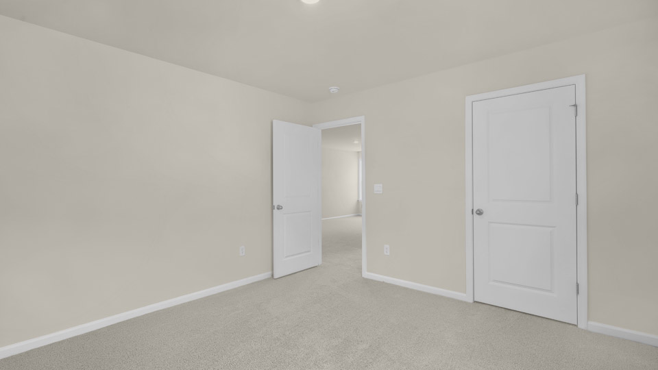 Bedroom with carpet