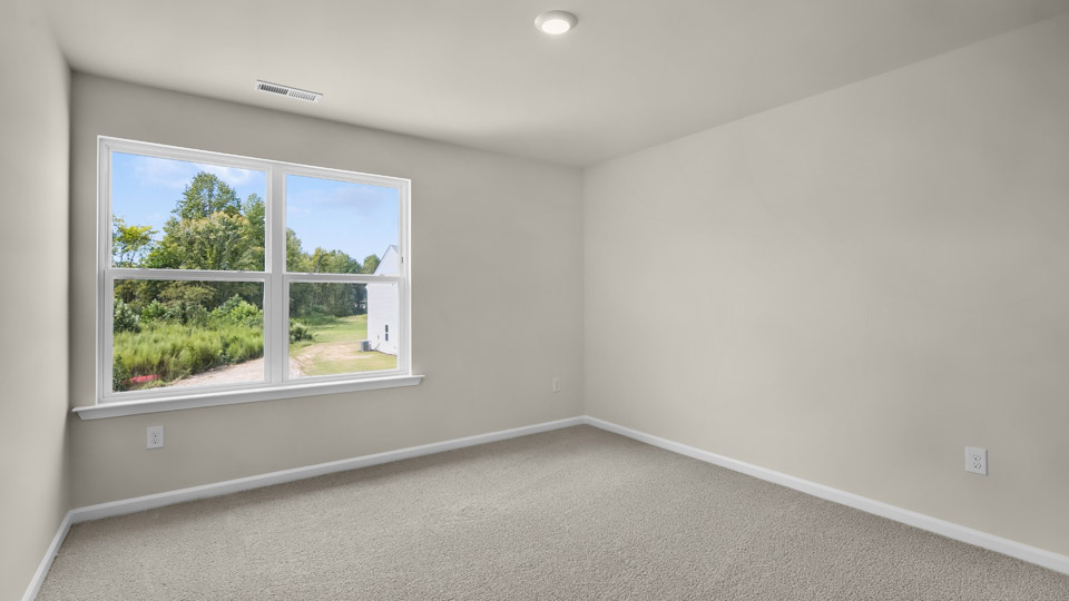 Bedroom with carpet