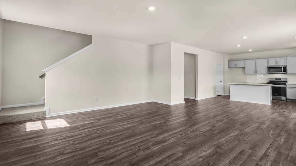 living room with revwood flooring