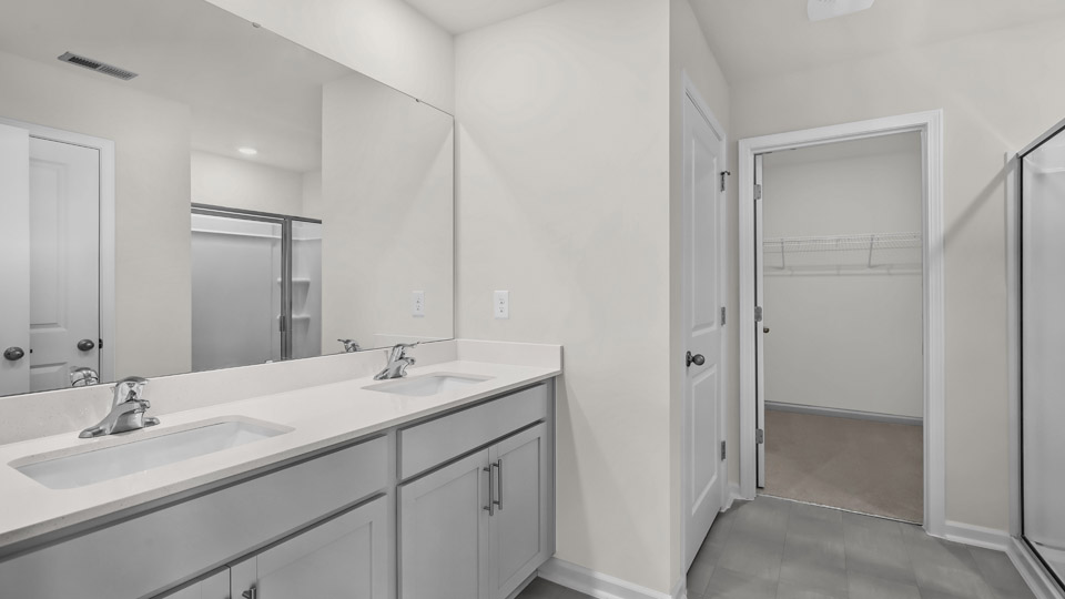 bathroom with quartz countertops