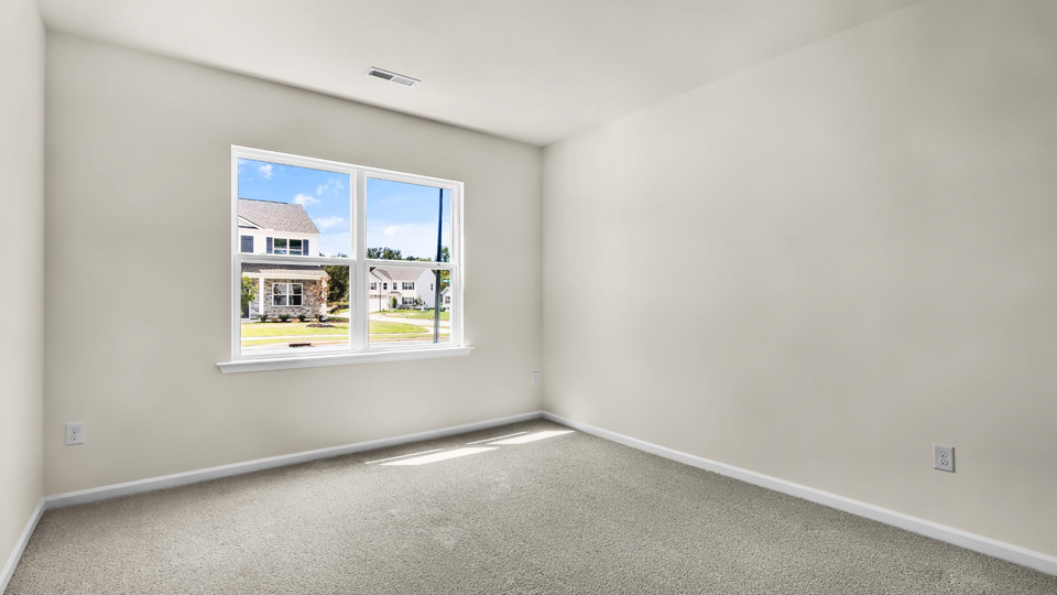 Bedroom with carpet