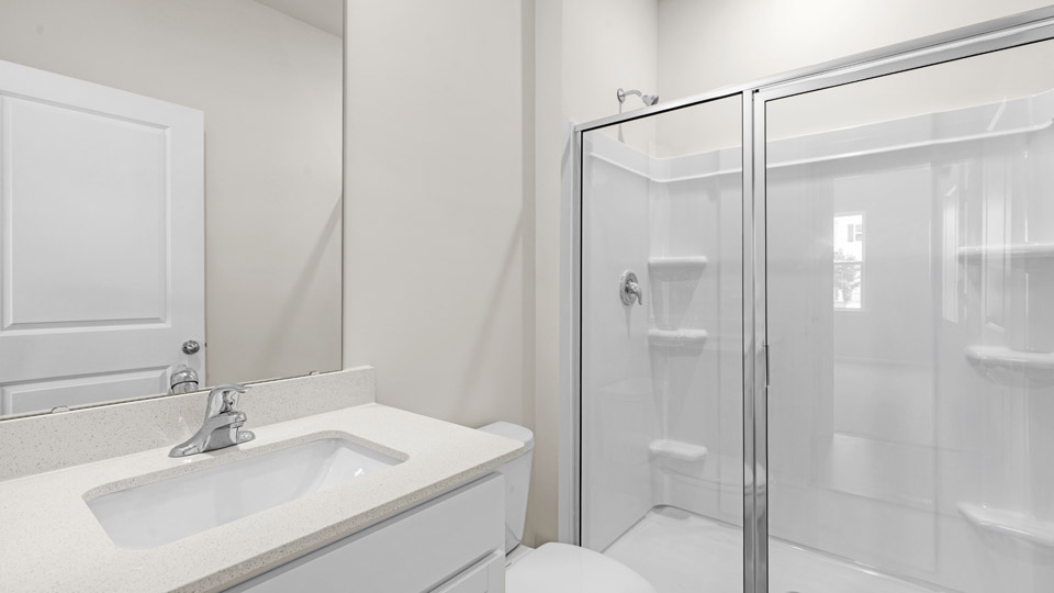 bathroom with quartz countertops