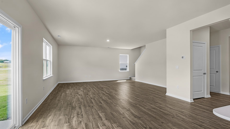 living room with revwood flooring