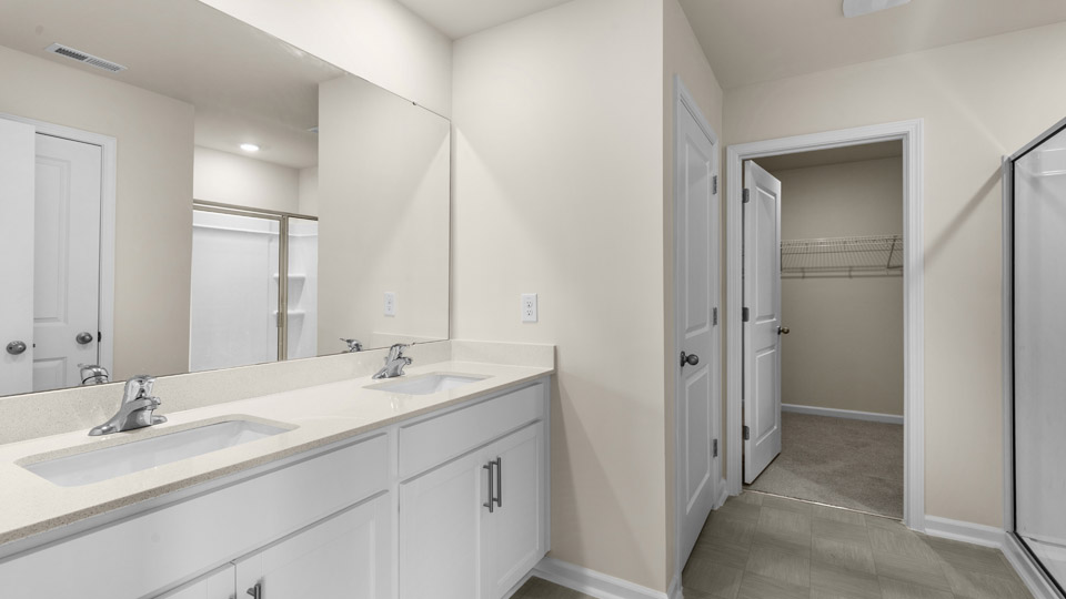 bathroom with quartz countertops