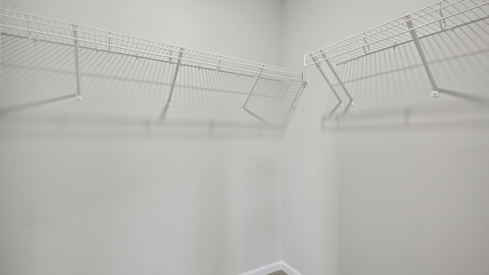 Walk-in closet with wire shelving