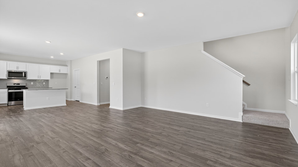 living room with revwood flooring
