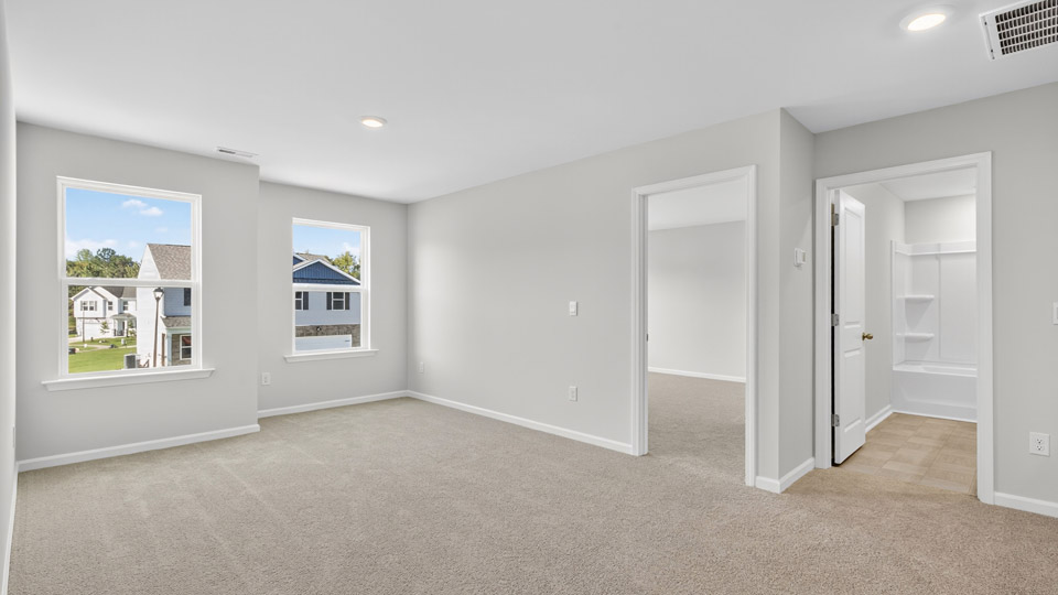 loft with carpet flooring