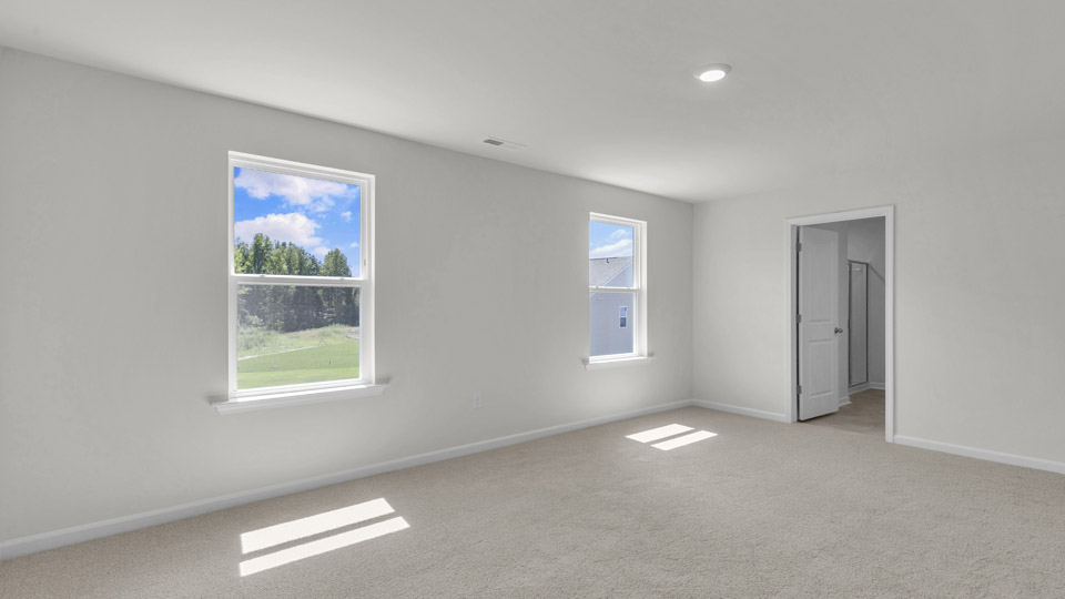 loft with carpet flooring