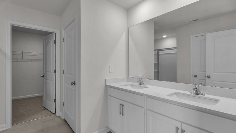 bathroom with quartz countertops