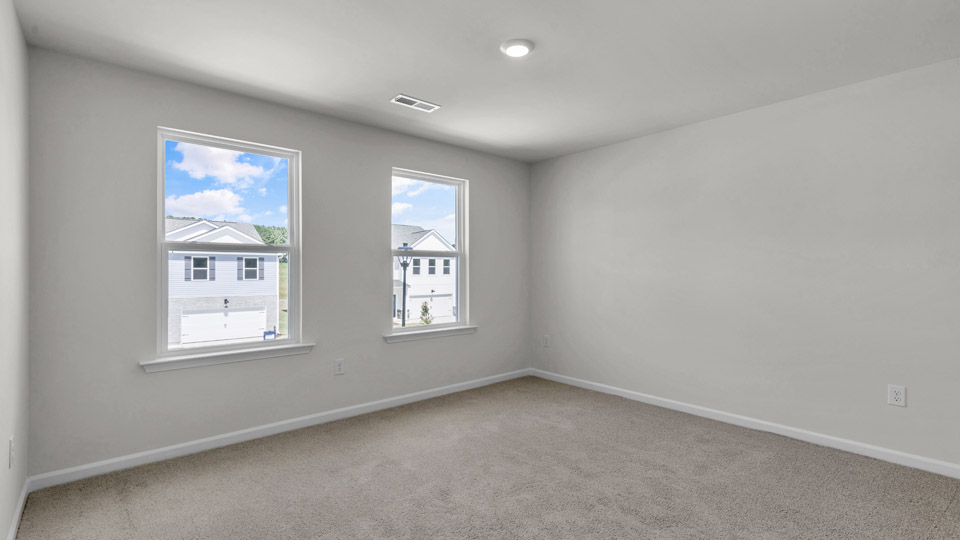 loft with carpet flooring