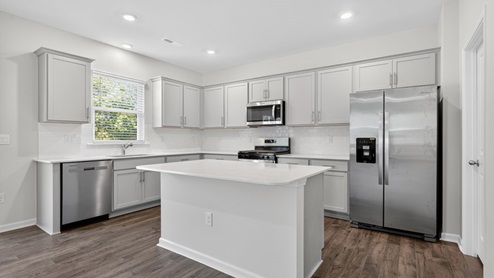 kitchen with stainless steel appliances and quartz countertops