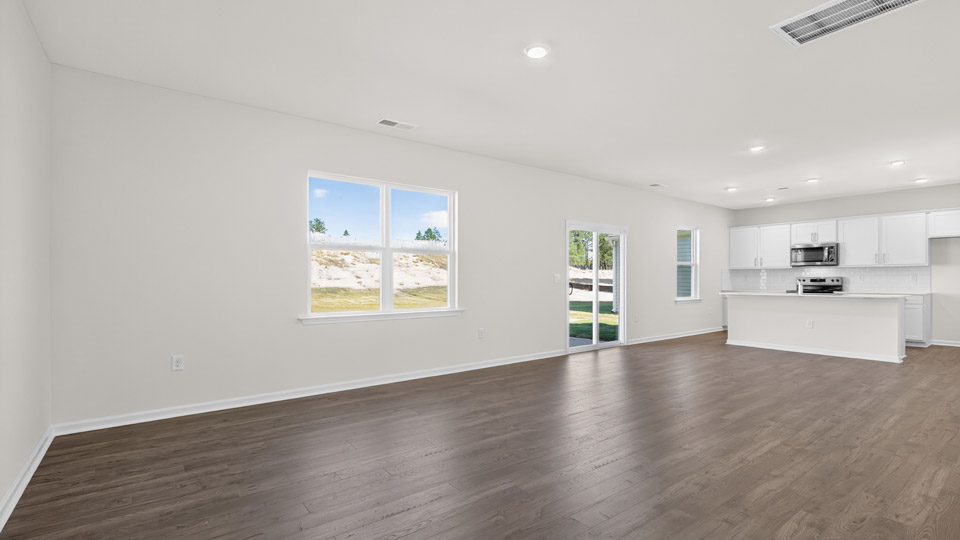 living room with revwood flooring