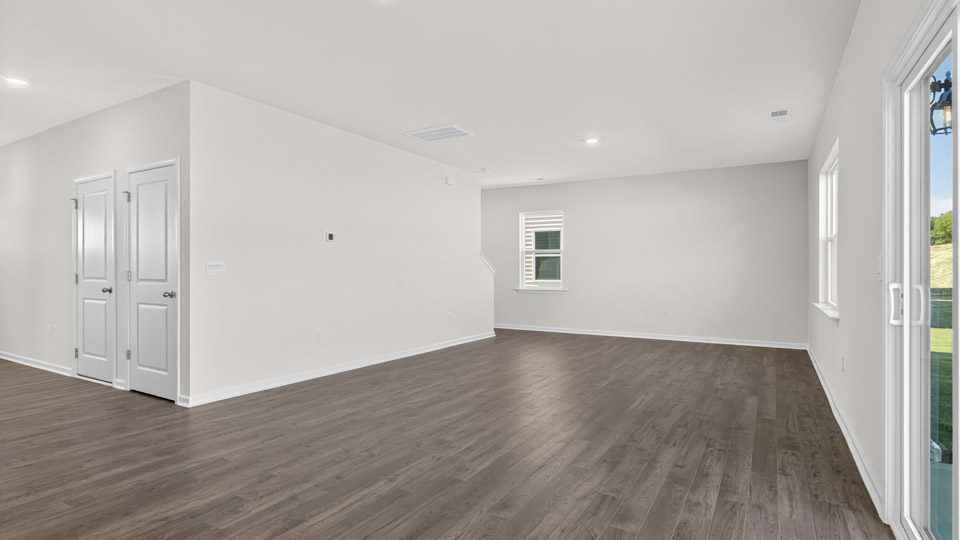 living room with revwood flooring