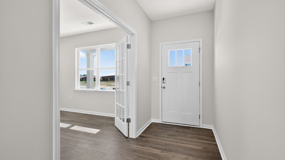 foyer entryway with revwood flooring