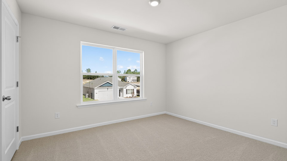 loft with carpet flooring