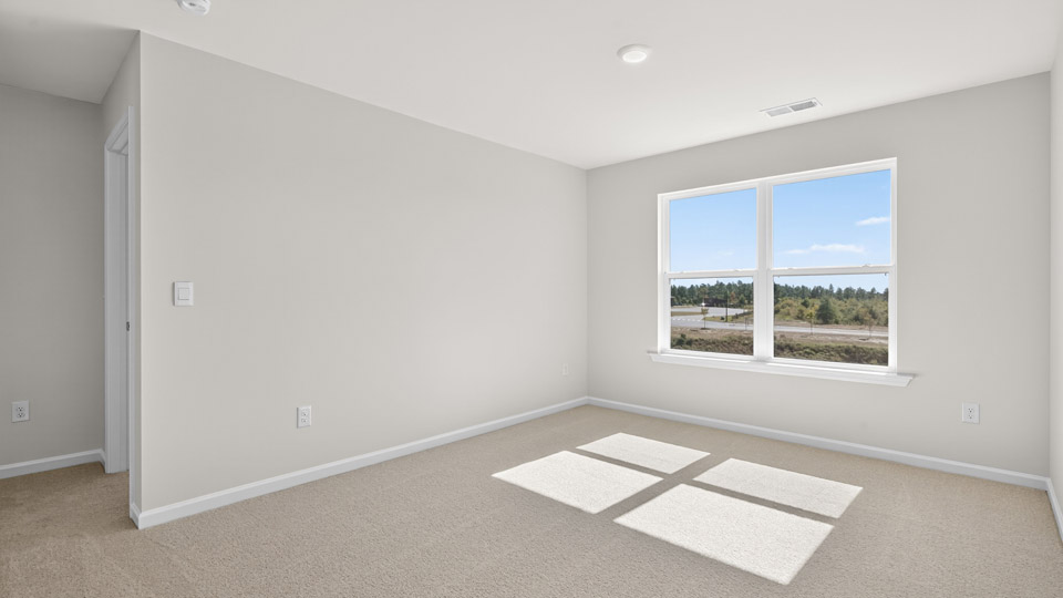loft with carpet flooring