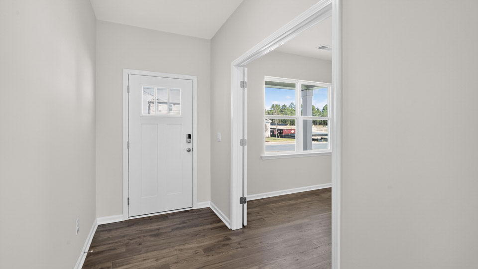 entryway foyer with revwood flooring