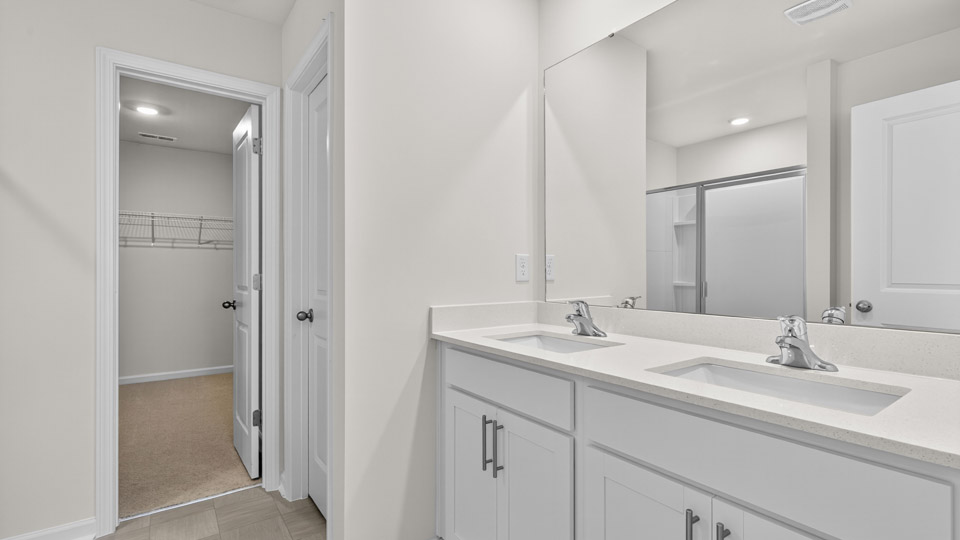 bathroom with quartz countertops