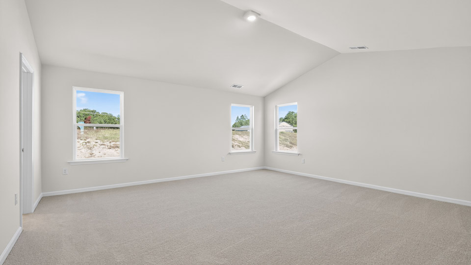 bedroom with vaulted ceiling