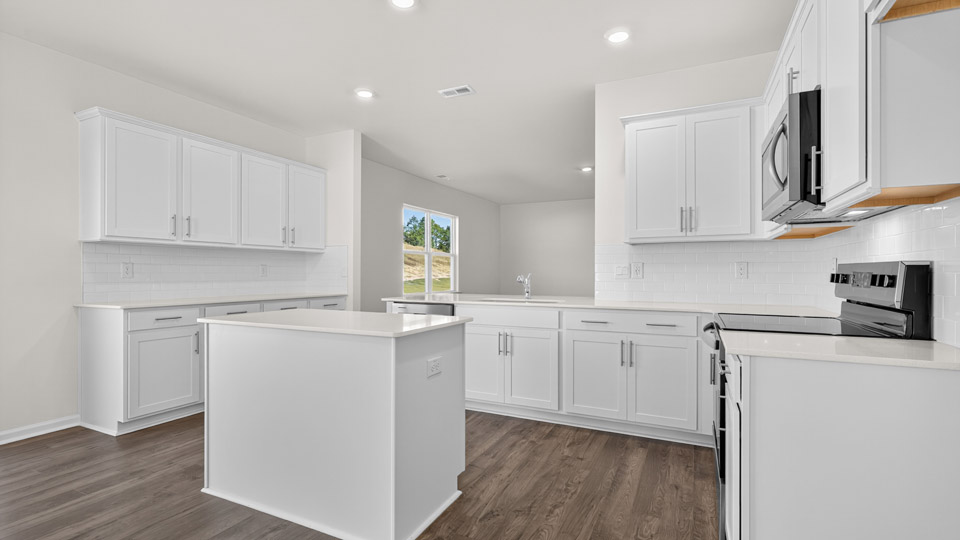 breakfast area with revwood flooring and sliding glass doors
