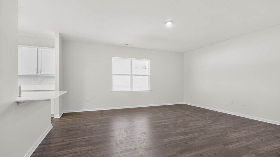 living room with revwood flooring