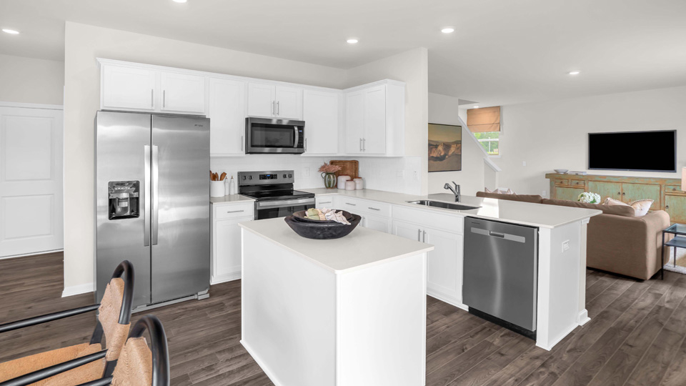 kitchen with white cabinets and quartz countertops