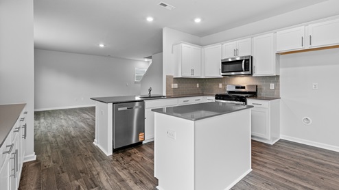 Kitchen with white cabinets