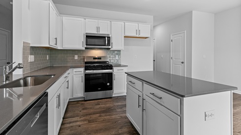 Kitchen with white cabinets