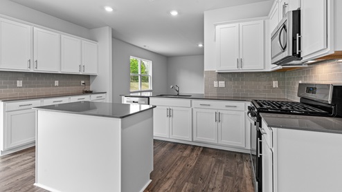 Kitchen with white cabinets