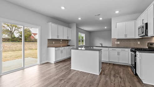 Kitchen with white cabinets