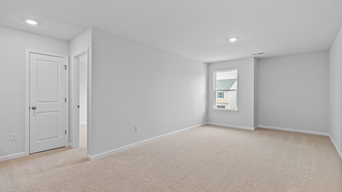 Bedroom with carpet flooring