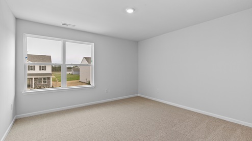Bedroom with carpet flooring