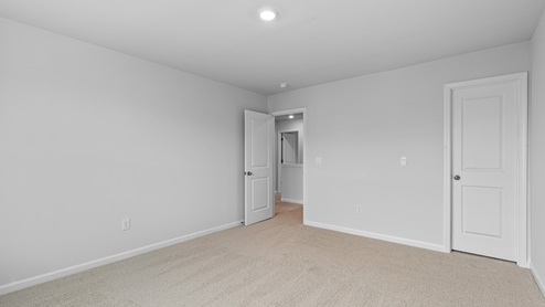 Bedroom with carpet flooring