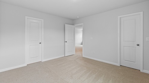Bedroom with carpet flooring