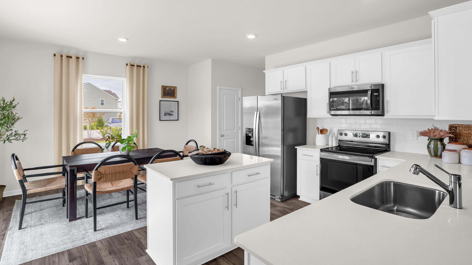 kitchen with white cabinets and quartz countertops