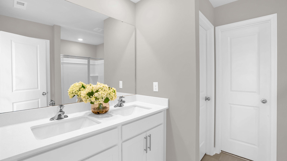 bathroom with quartz countertops