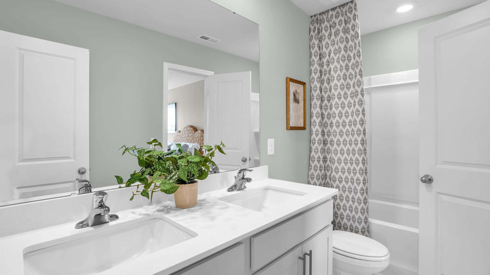 bathroom with quartz countertops