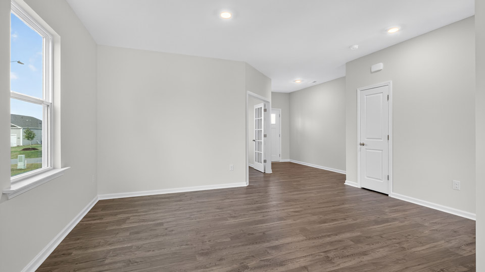 living room with revwood flooring