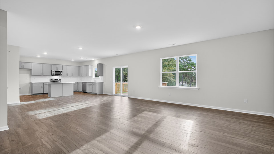 living room with revwood flooring