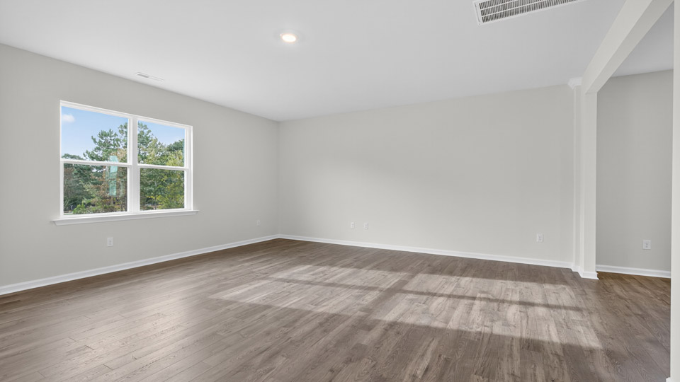 living room with revwood flooring
