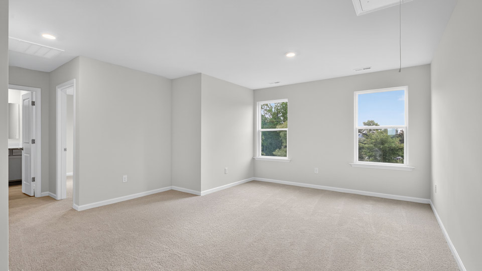 loft with carpet flooring