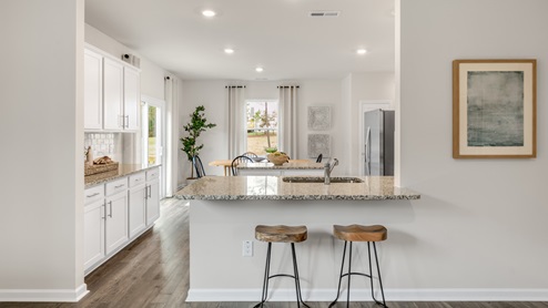 Kitchen with stainless steel appliances and granite countertops