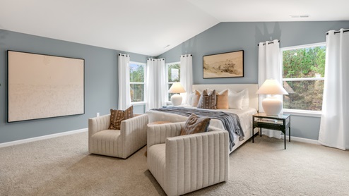 Bedroom with natural lighting and carpet flooring