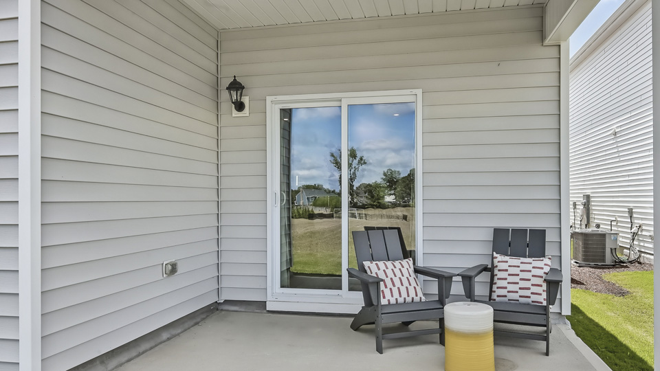 covered porch with sliding glass doors