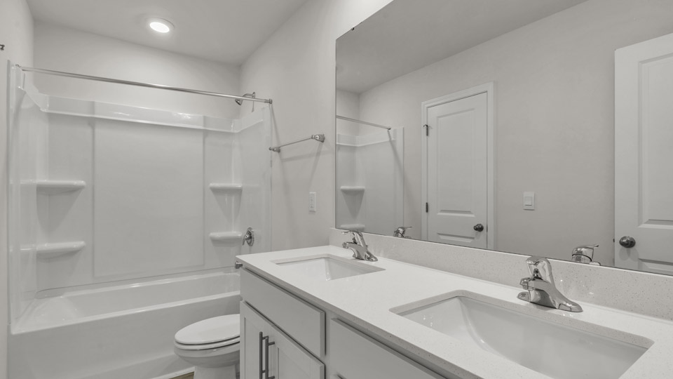 bathroom with quartz countertops