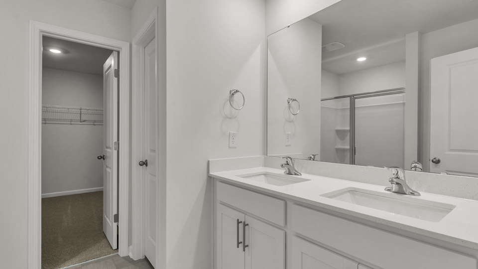 bathroom with quartz countertops