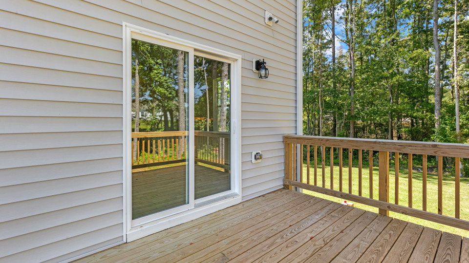 back deck with sliding glass doors
