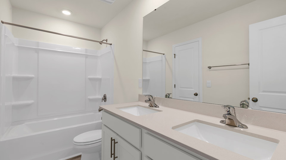 bathroom with quartz countertops