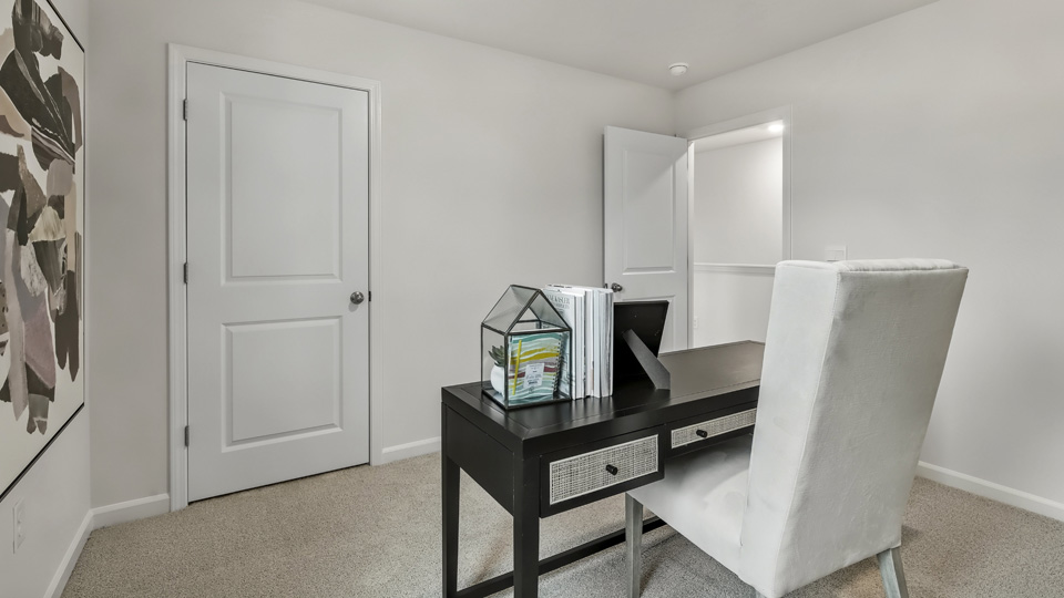 bedroom or office with carpet flooring