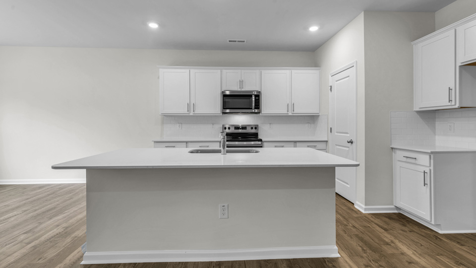 Kitchen with white cabinets